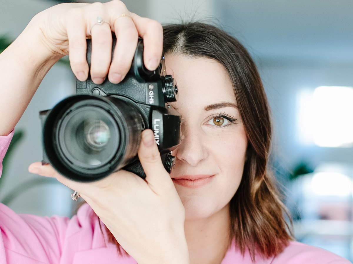 Josie Storbakken with a camera to her eye